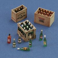 Champagne, cognac e wine bottles with crates