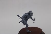 German WWII Tank Hunter running with 98k rifle and grenades